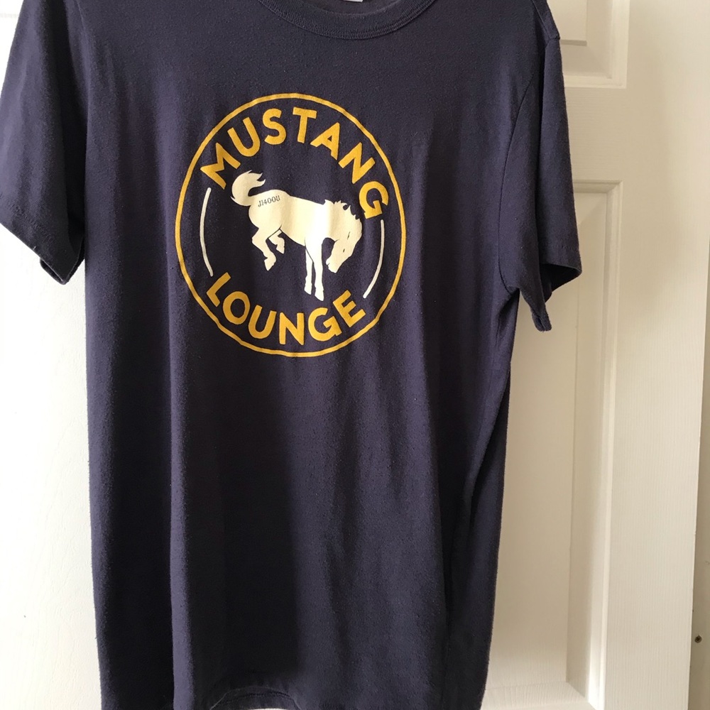Jason Isbell concert shirt.